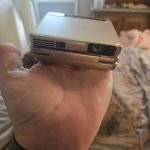 Aurzen ZIP Tri-Fold DLP Truly Mini Projector. Pocket Size. Zero-Lag Focus. One-Click Screen Mirroring. Full-Screen Mode. Type-C Fast Charging. 5.000mAh Battery. Indoor Outdoor Portable Projector.Gold photo review