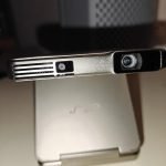 Aurzen ZIP Tri-Fold DLP Truly Mini Projector. Pocket Size. Zero-Lag Focus. One-Click Screen Mirroring. Full-Screen Mode. Type-C Fast Charging. 5.000mAh Battery. Indoor Outdoor Portable Projector.Gold photo review